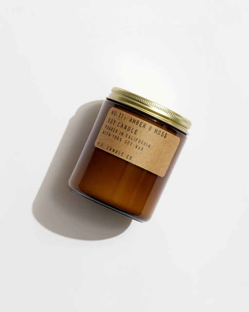 P.F. Candle Standard Candle - amber & moss Hot